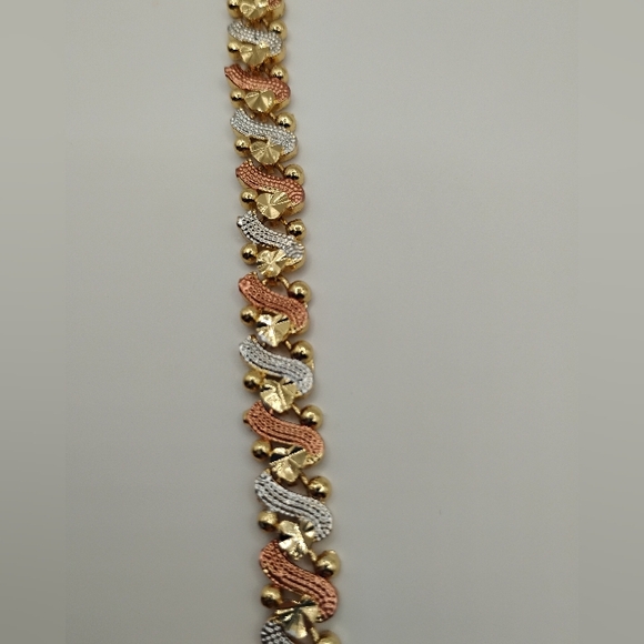 Elegant Gold, Silver, and Rose Gold Bracelet - Picture 6 of 7